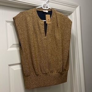 Hailey and co gold shimmer crop sleeveless top with black lining.